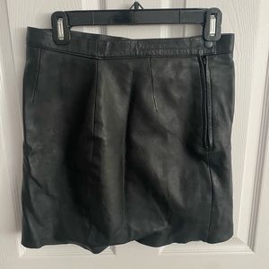 Vintage black leather mini-skirt.